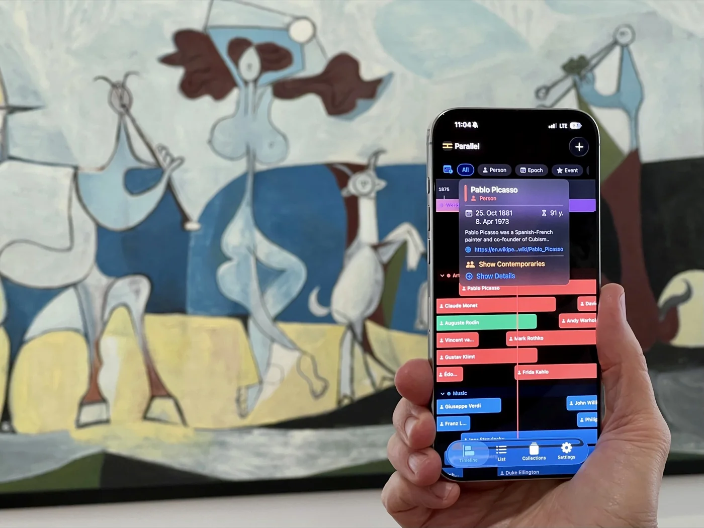 Parallel in use at a museum, showing Pablo Picasso's timeline in front of a Picasso painting